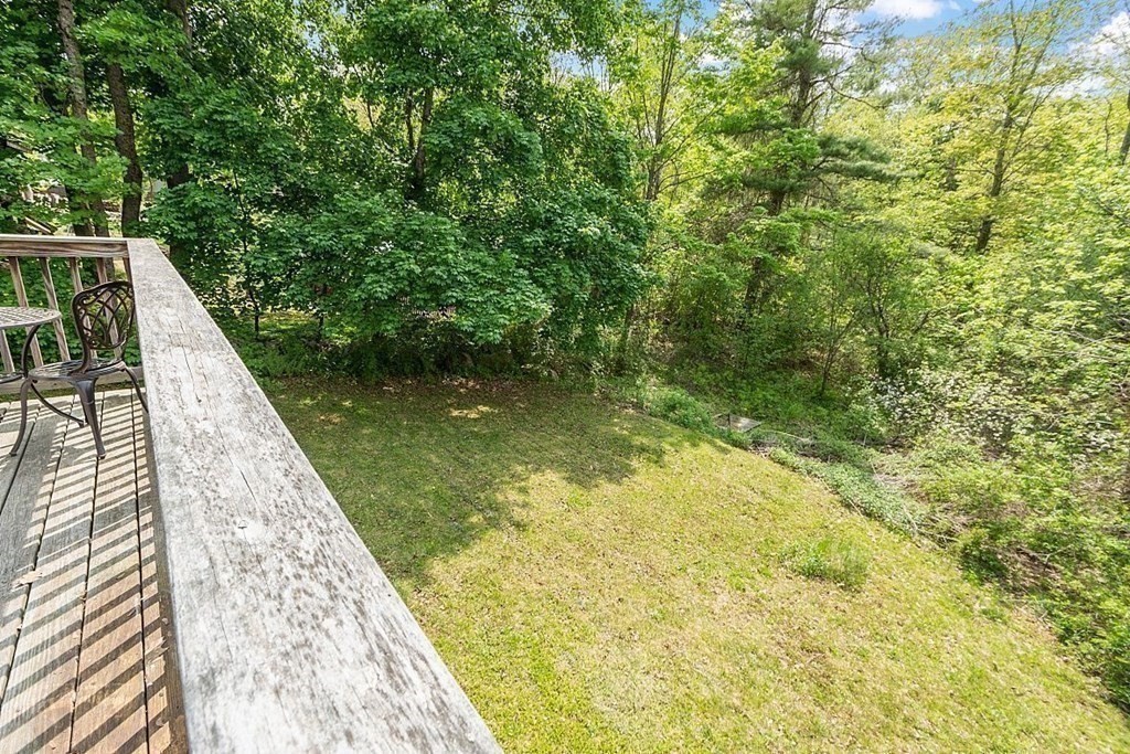 237 Spring Street Athol, MA 01331 - Photo 15 of 35 a view of swimming pool with lawn chairs and wooden fence