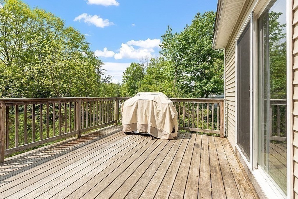 237 Spring Street Athol, MA 01331 - Photo 16 of 35 a view of balcony with wooden floor and fence