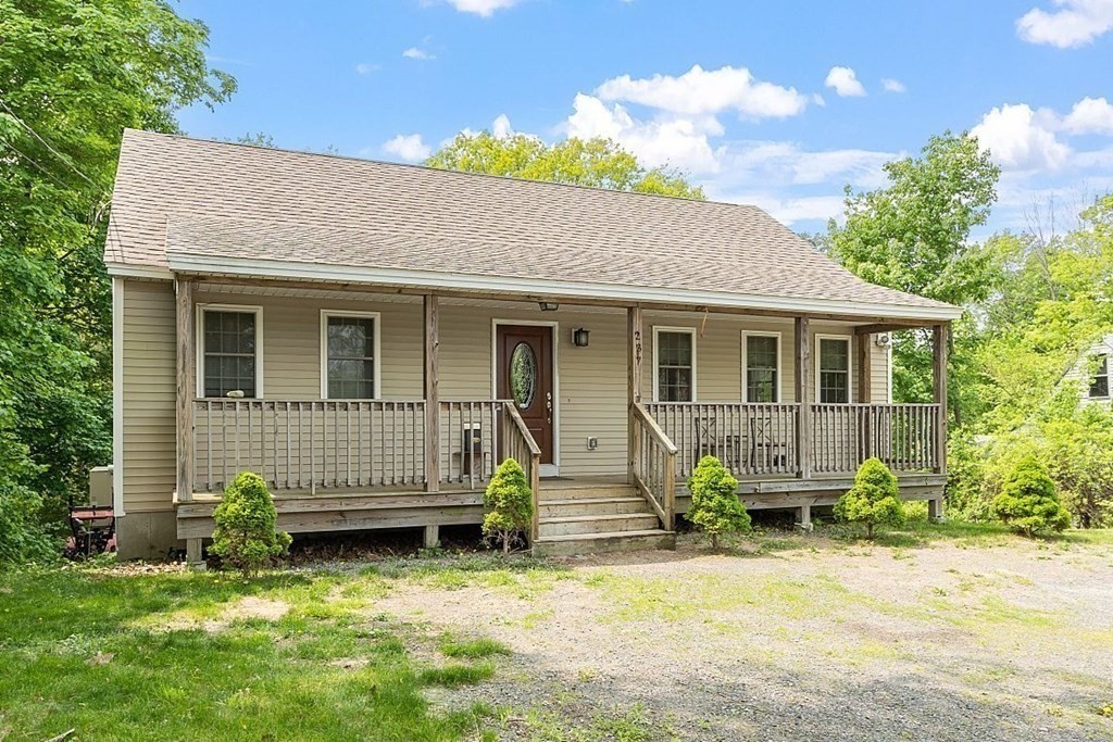 237 Spring Street Athol, MA 01331 - Photo 2 of 35 a front view of a house with a yard
