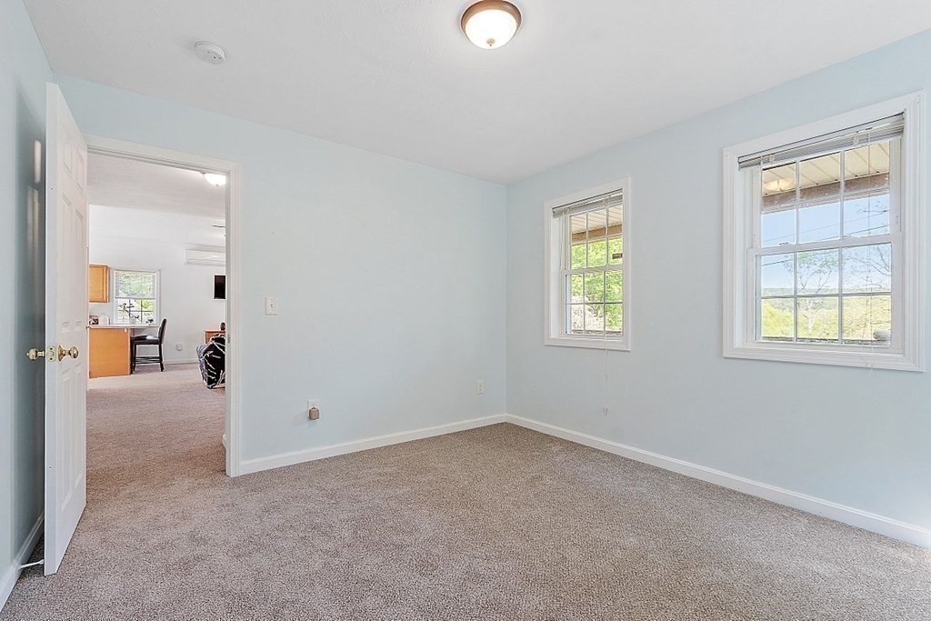 237 Spring Street Athol, MA 01331 - Photo 21 of 35 an empty room with windows and closet
