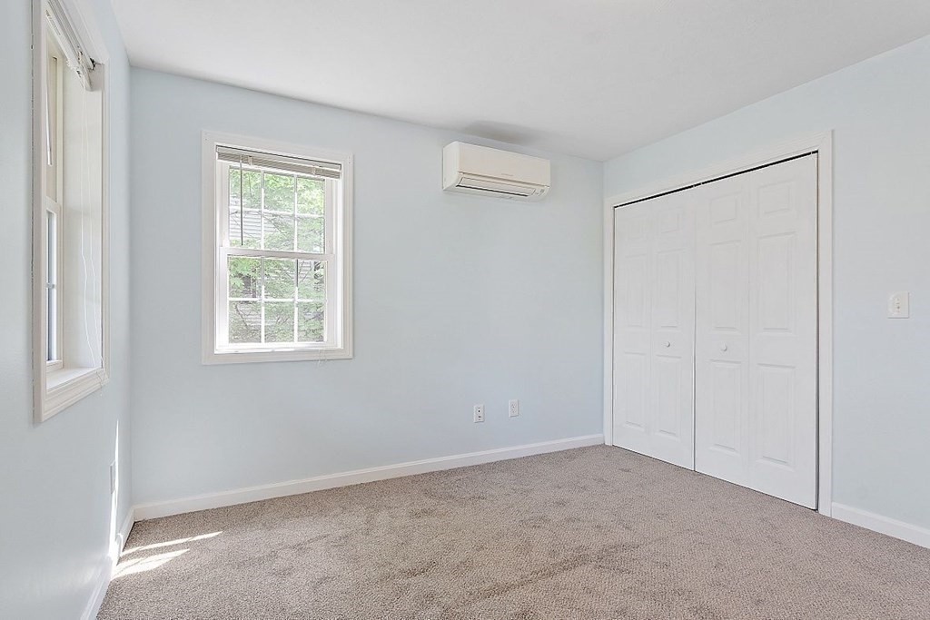 237 Spring Street Athol, MA 01331 - Photo 22 of 35 an empty room with windows and closet