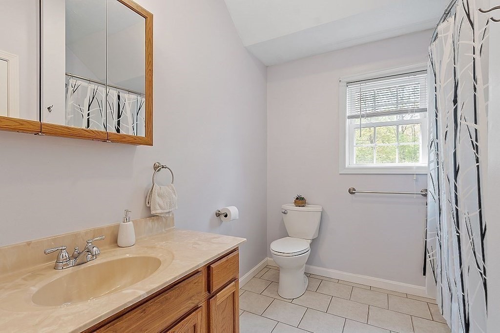 237 Spring Street Athol, MA 01331 - Photo 27 of 35 a bathroom with a sink toilet and vanity