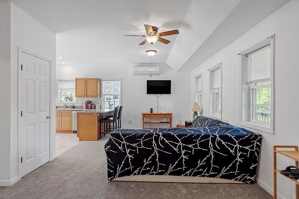 237 Spring Street Athol, MA 01331 - Photo 8 of 35 a living room with furniture a flat screen tv and a window