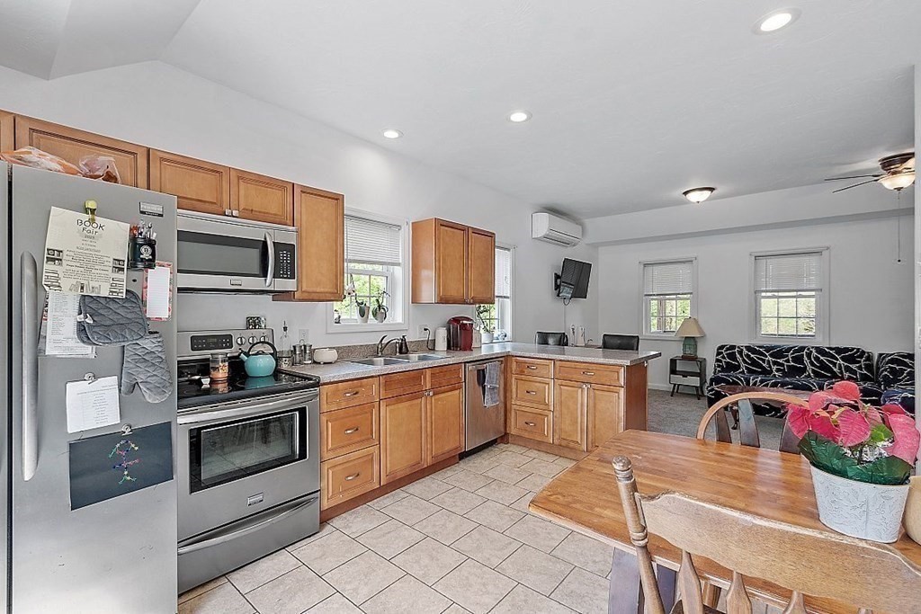 237 Spring Street Athol, MA 01331 - Photo 10 of 35 a kitchen with granite countertop a sink and stainless steel appliances