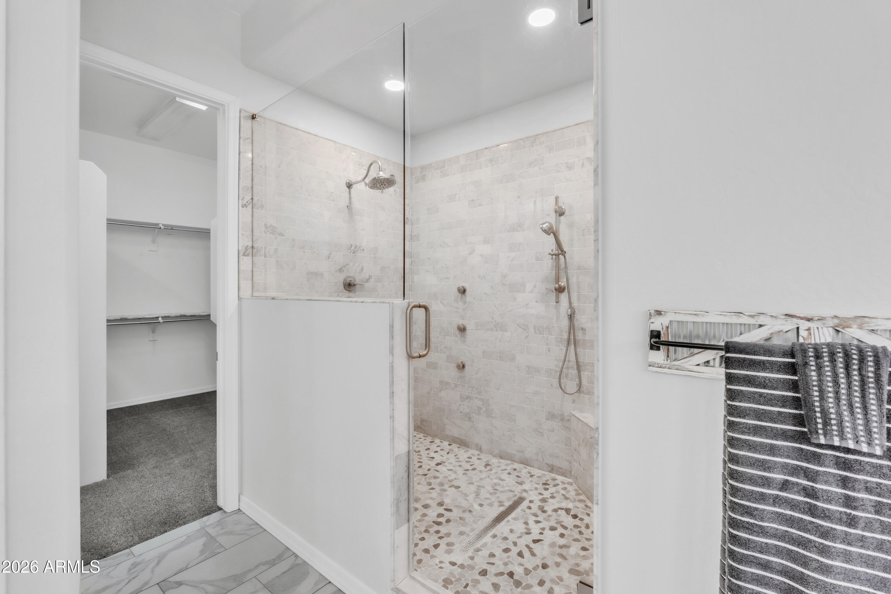 1615 West Red Fox Road Phoenix, AZ 85085 - Photo 32 of 64 a bathroom with a shower and a sink
