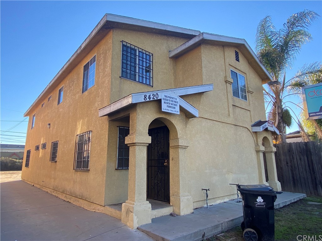 8420 South Broadway Los Angeles, CA 90003 - Photo 3 of 19 a view of a house with a door