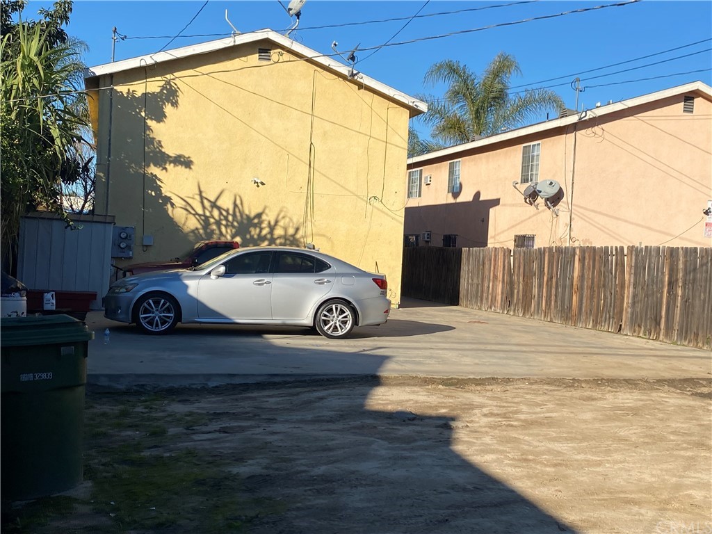 8420 South Broadway Los Angeles, CA 90003 - Photo 10 of 19 a car parked on the side of the road