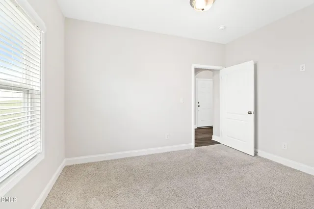 an empty room with an entryway