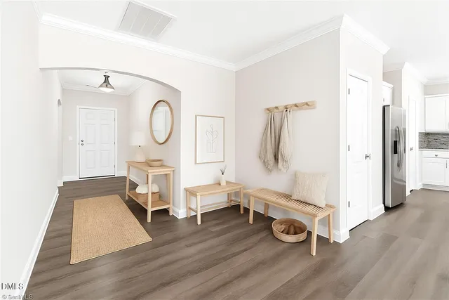 a very nice looking room with wooden floor