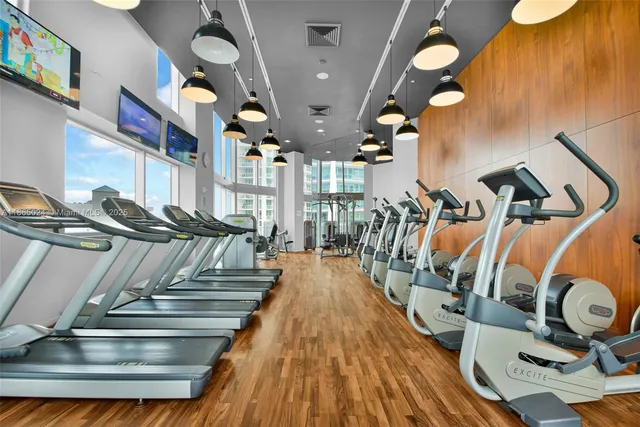 a view of a lake with tall buildings