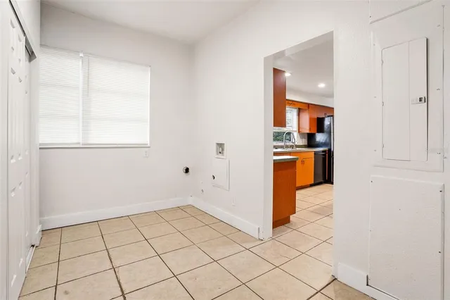 a view of yard with swimming pool and green space