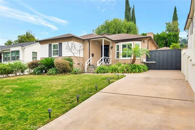 a view of a house with garden
