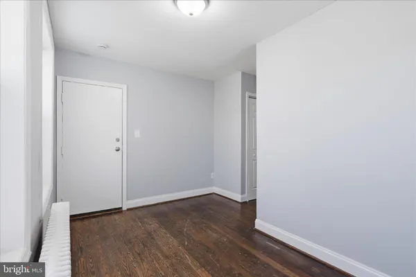 a view of small space with wooden floor