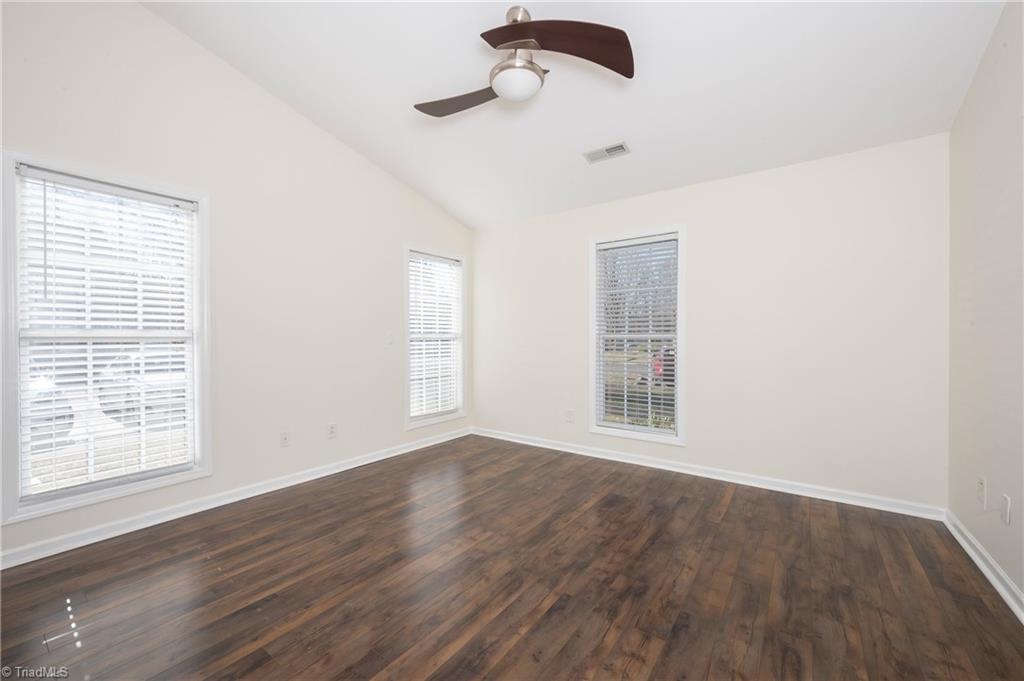 156 Pinewood Lane, Unit 101 Bermuda Run, NC 27006 - Photo 11 of 31 Primary bedroom on main level