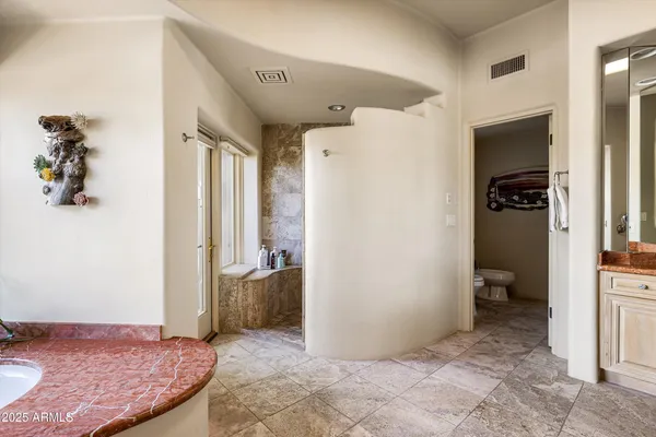 a view of livingroom with furniture and a rug