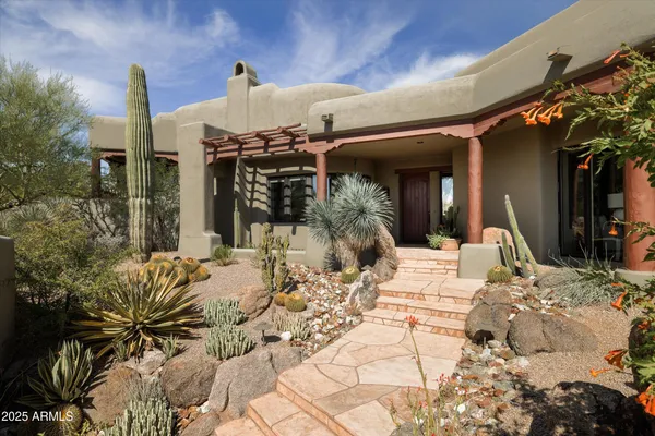 a view of a house with a patio