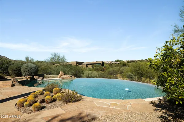 a front view of a house with swimming pool
