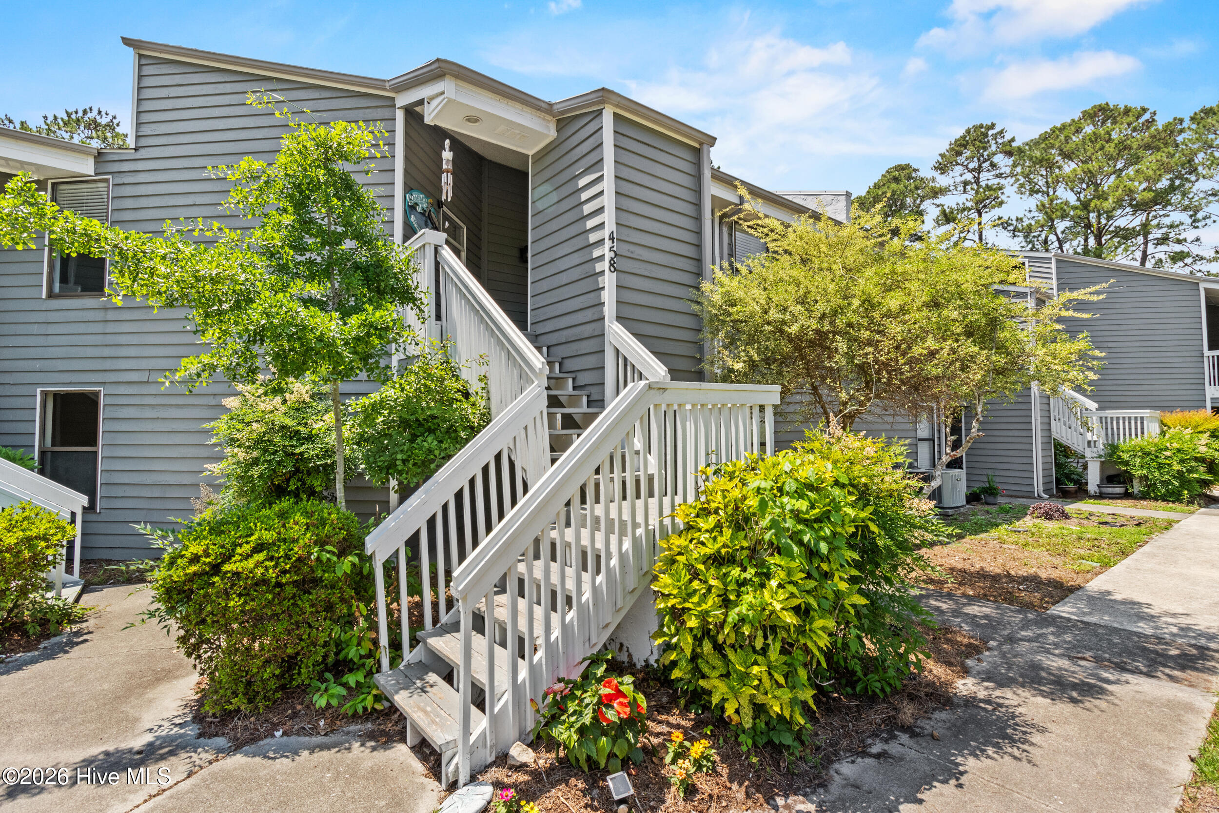 718 Azalea Drive, Unit 458 Hampstead, NC 28443 - Photo 1 of 38 1_front exterior