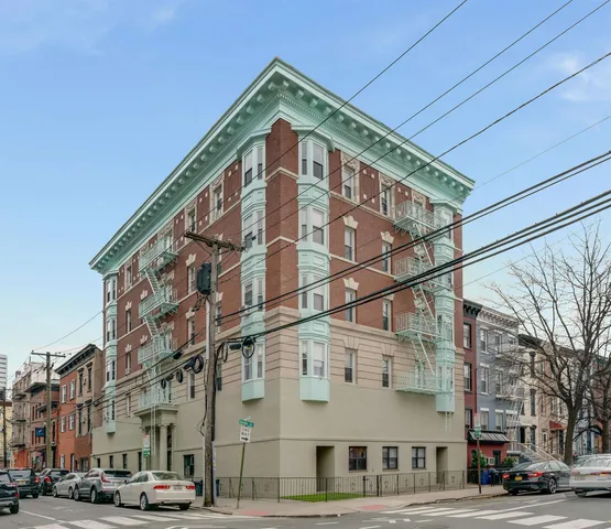 a view of a building and a street