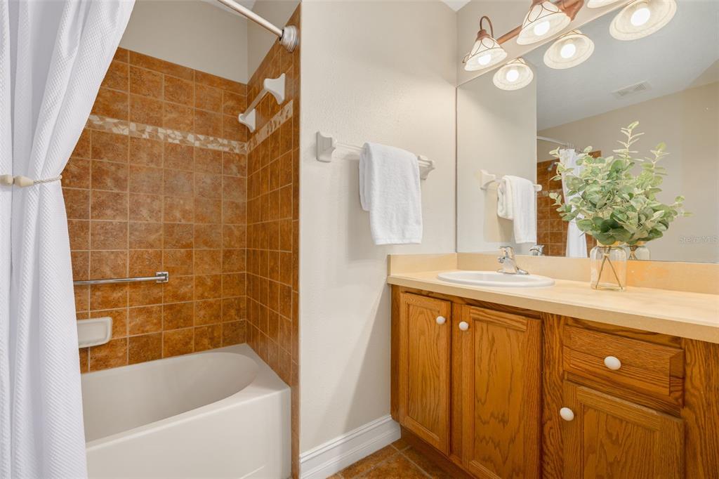 1701 Westerham Loop Trinity, FL 34655 - Photo 15 of 40 a bathroom with a sink and a bathtub
