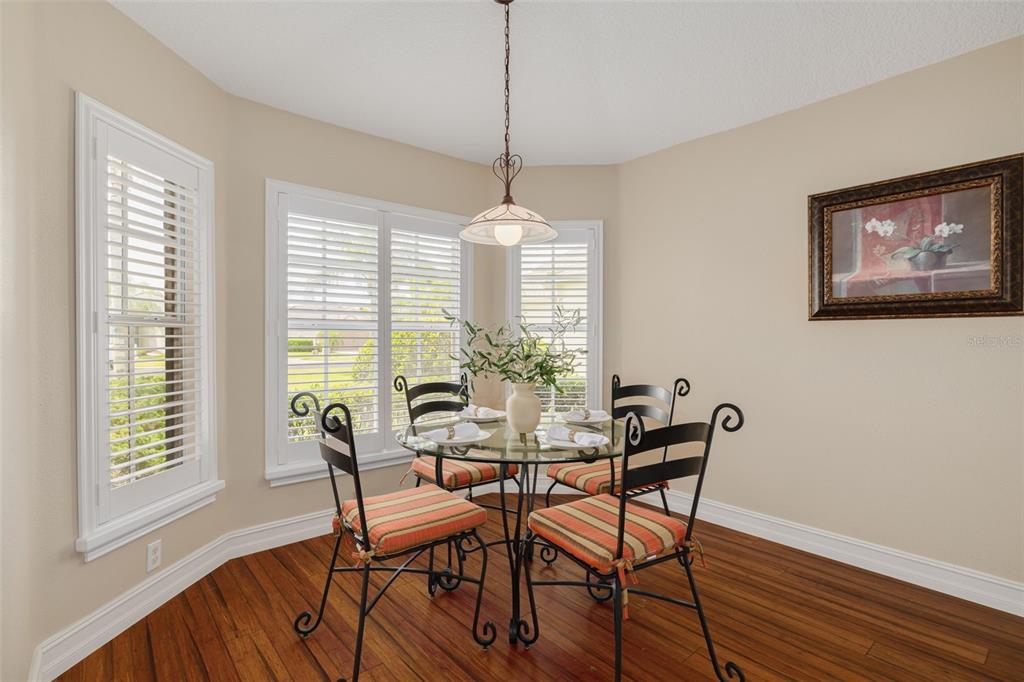1701 Westerham Loop Trinity, FL 34655 - Photo 19 of 40 a dining room with furniture and window