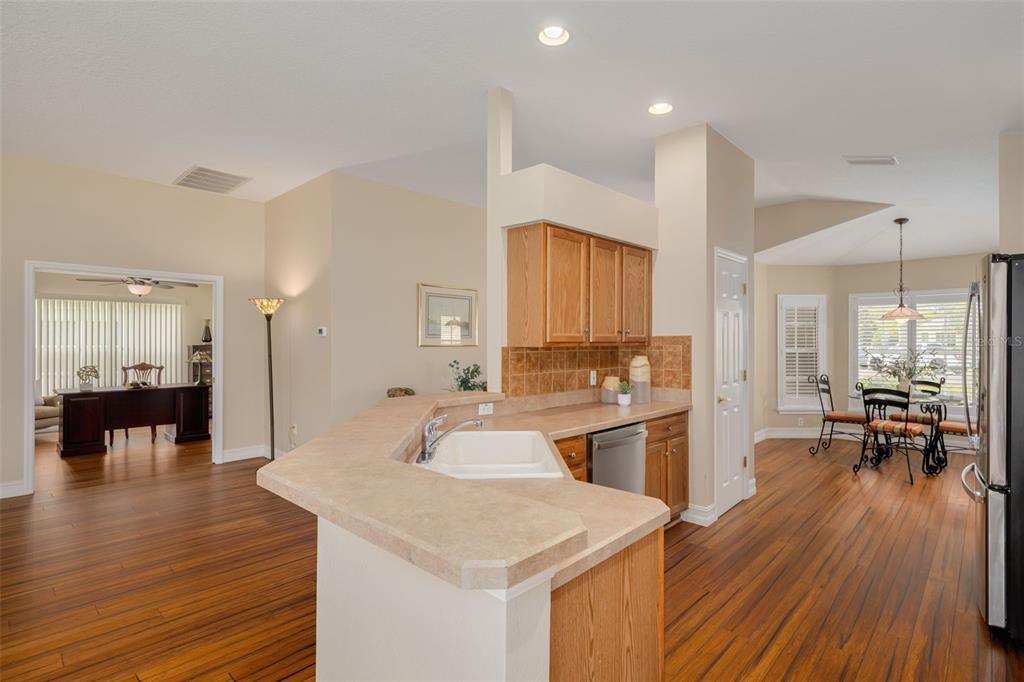 1701 Westerham Loop Trinity, FL 34655 - Photo 20 of 40 a large kitchen with a table and chairs