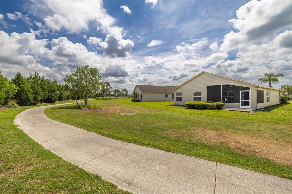 1701 Westerham Loop Trinity, FL 34655 - Photo 2 of 40 a view of a house with a yard