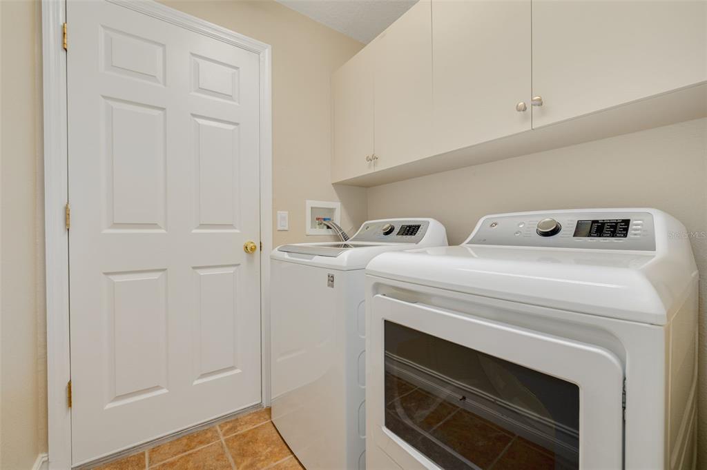 1701 Westerham Loop Trinity, FL 34655 - Photo 29 of 40 a utility room with dryer and washer