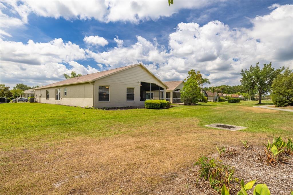 1701 Westerham Loop Trinity, FL 34655 - Photo 30 of 40 a view of a house with a yard