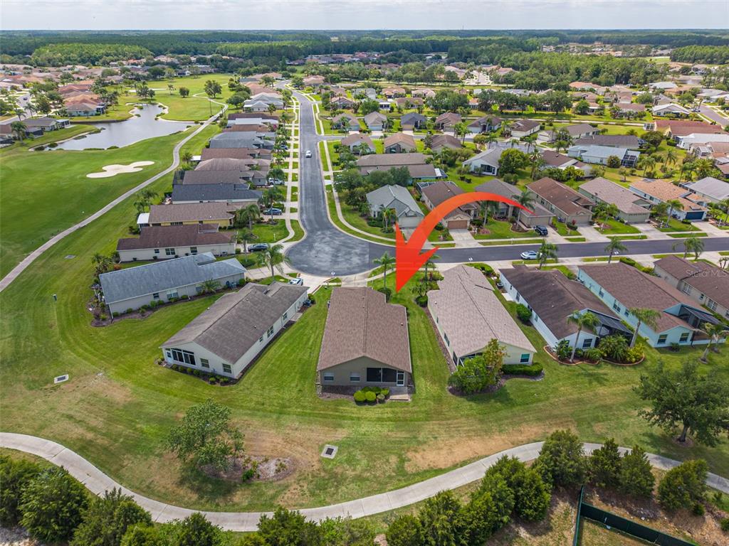 1701 Westerham Loop Trinity, FL 34655 - Photo 35 of 40 an aerial view of residential houses with outdoor space and swimming pool