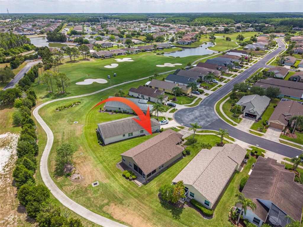 1701 Westerham Loop Trinity, FL 34655 - Photo 5 of 40 an aerial view of a pool patio patio and lake view