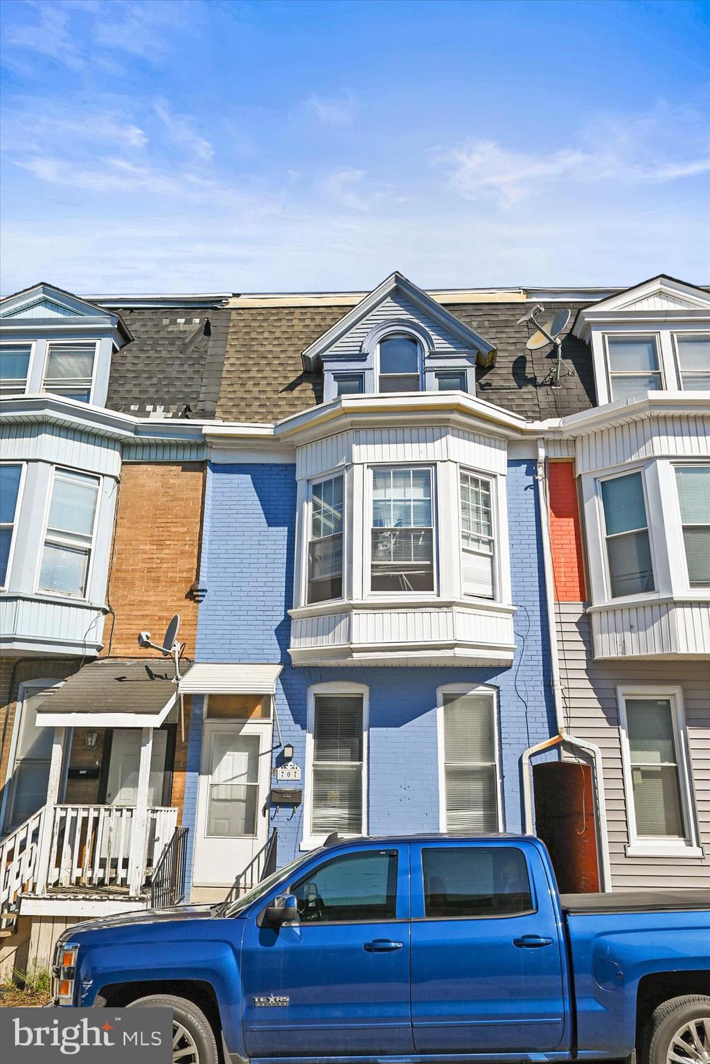 707 York Street York, PA 17403 - Photo 1 of 32 a front view of a residential apartment building with a yard