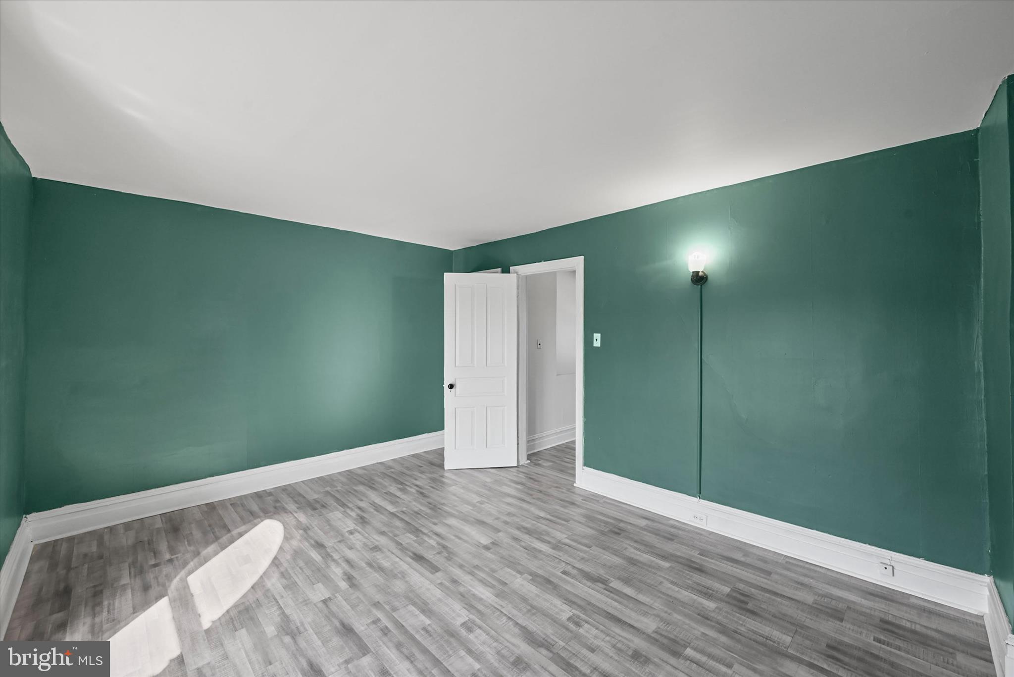 707 York Street York, PA 17403 - Photo 23 of 32 a view of a big room with closet and wooden floor