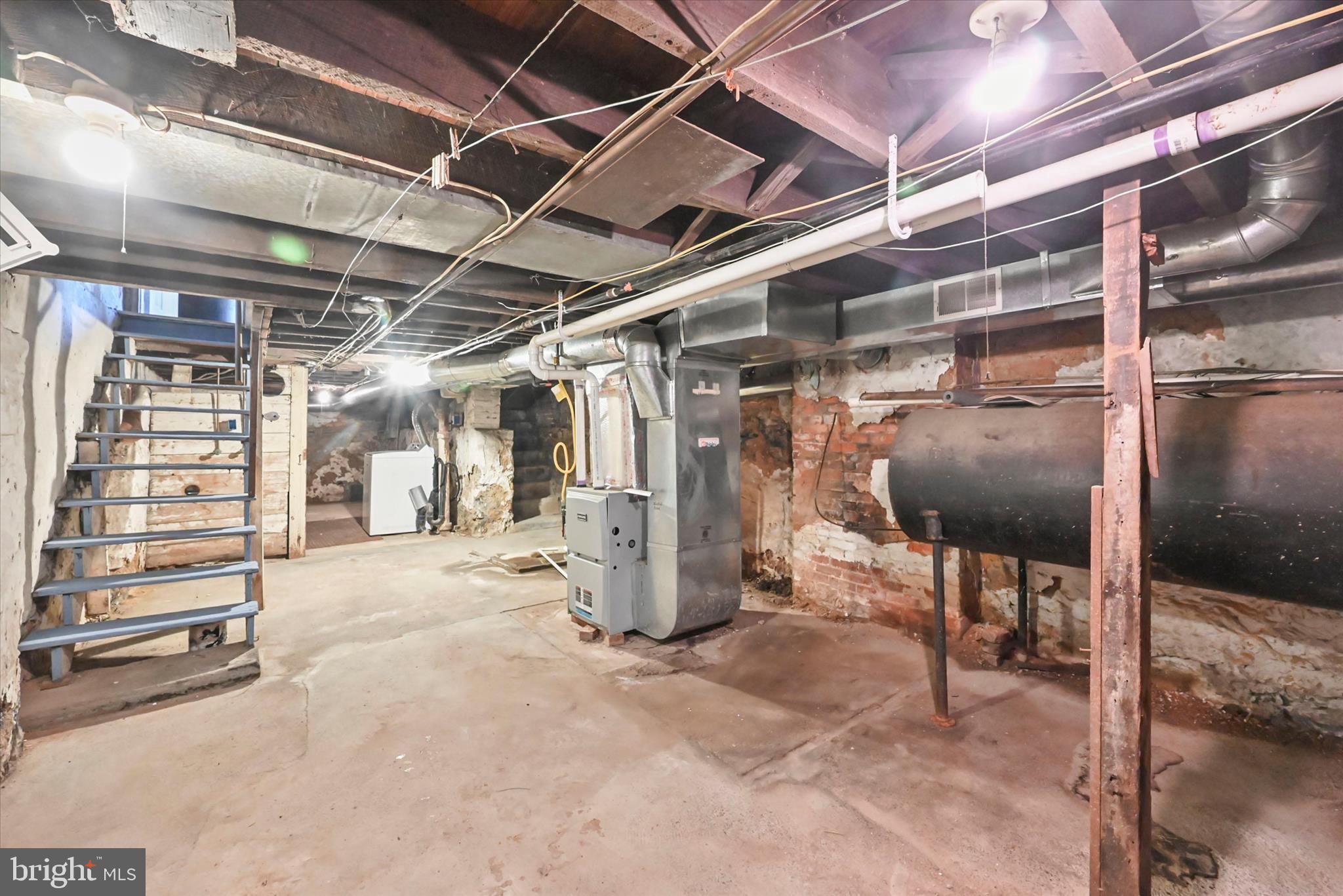 707 York Street York, PA 17403 - Photo 25 of 32 a view of water heater room with refrigerator