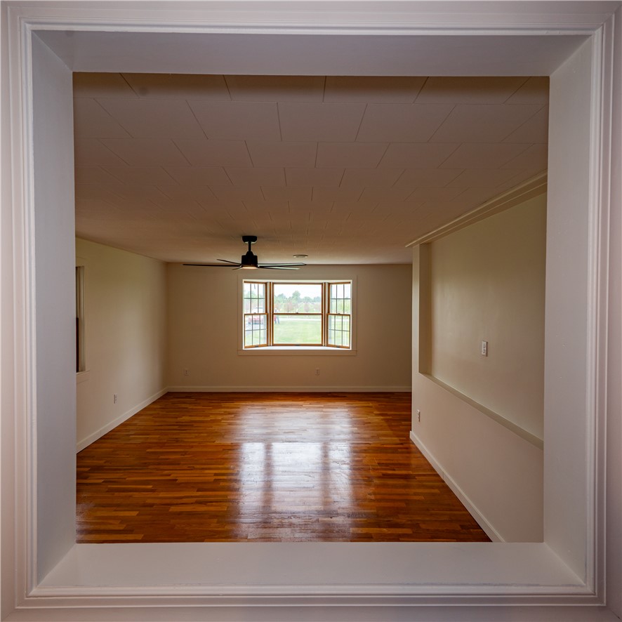 11296 Pansing Road Brookville, OH 45309 - Photo 15 of 53 This airy room features rich hardwood flooring and a bright bay window overlooking a verdant landscape.