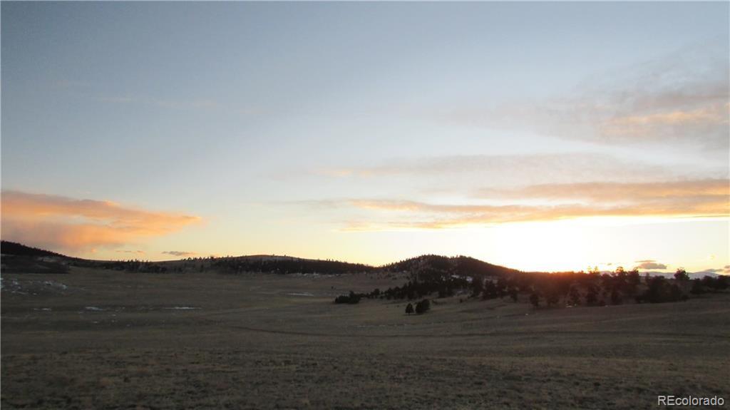 15 Co Road Como, CO 80432 - Photo 11 of 13 a view of mountains with green field and mountains