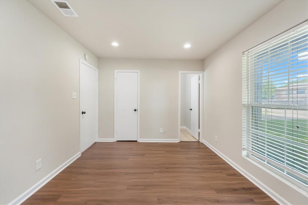 304 East Stone Road Wylie, TX 75098 - Photo 8 of 19 a view of hallway with wooden floor