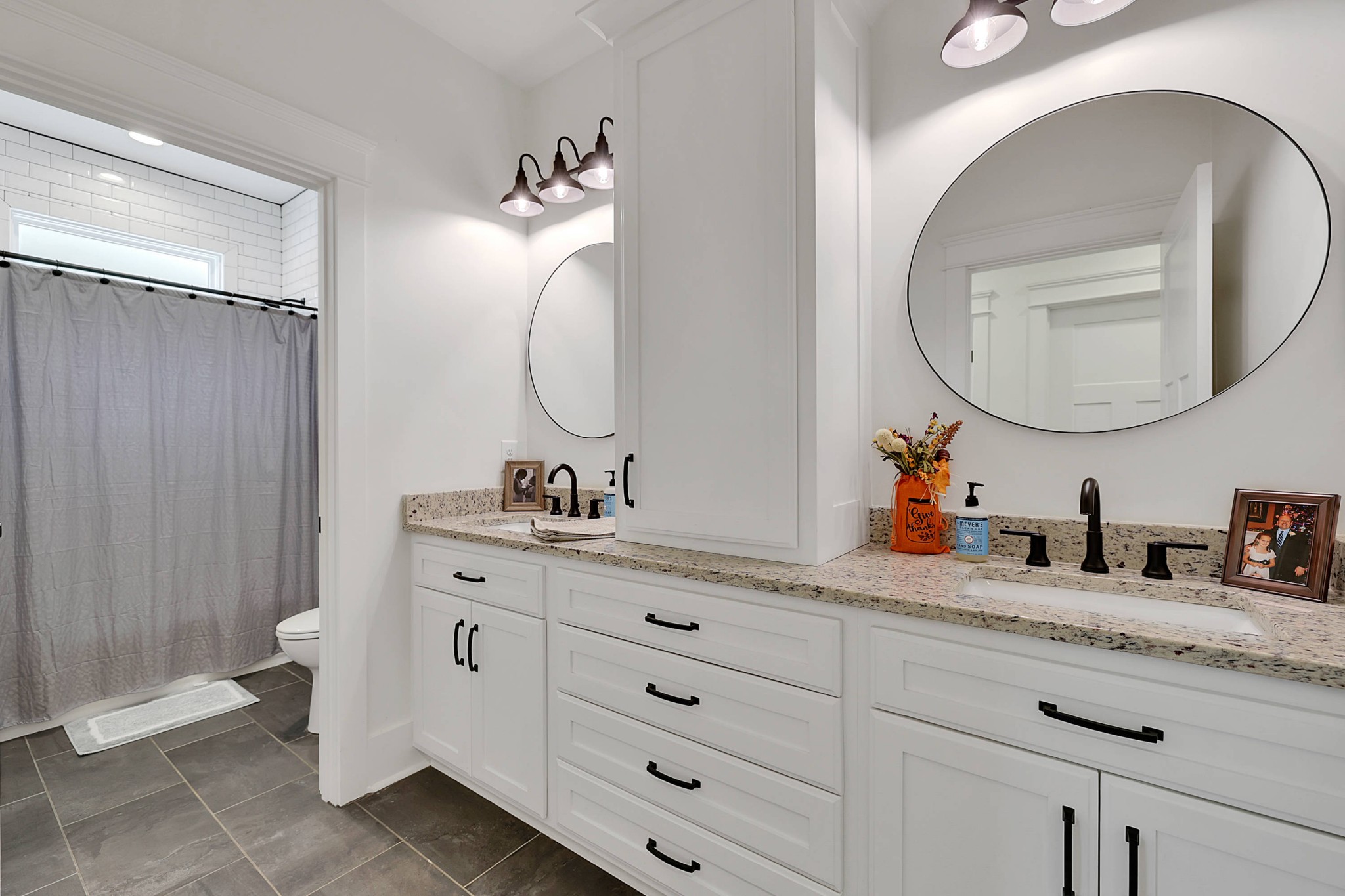 7120 New Hope Road Fairview, TN 37062 - Photo 54 of 70 a bathroom with a double vanity sink and a mirror