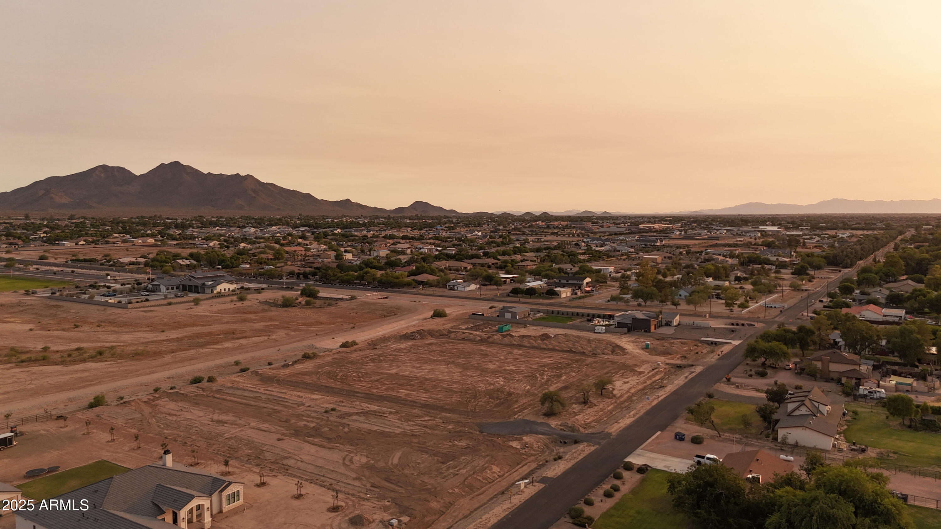 19215 East Cloud Road, Unit 2A Queen Creek, AZ 85142 - Photo 11 of 69 an aerial view of residential houses with outdoor space