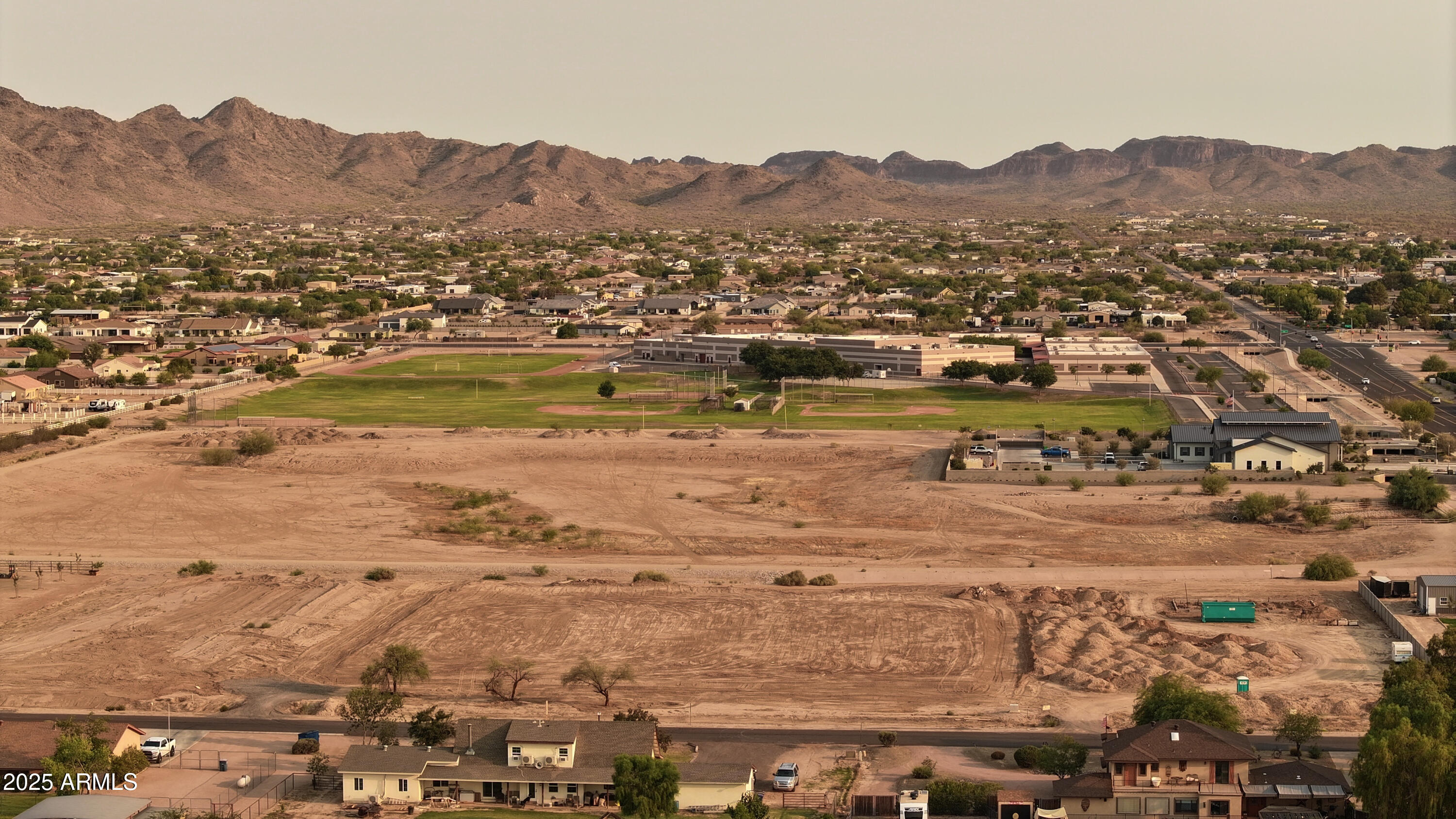 19215 East Cloud Road, Unit 2A Queen Creek, AZ 85142 - Photo 16 of 69 an aerial view of residential houses and city space