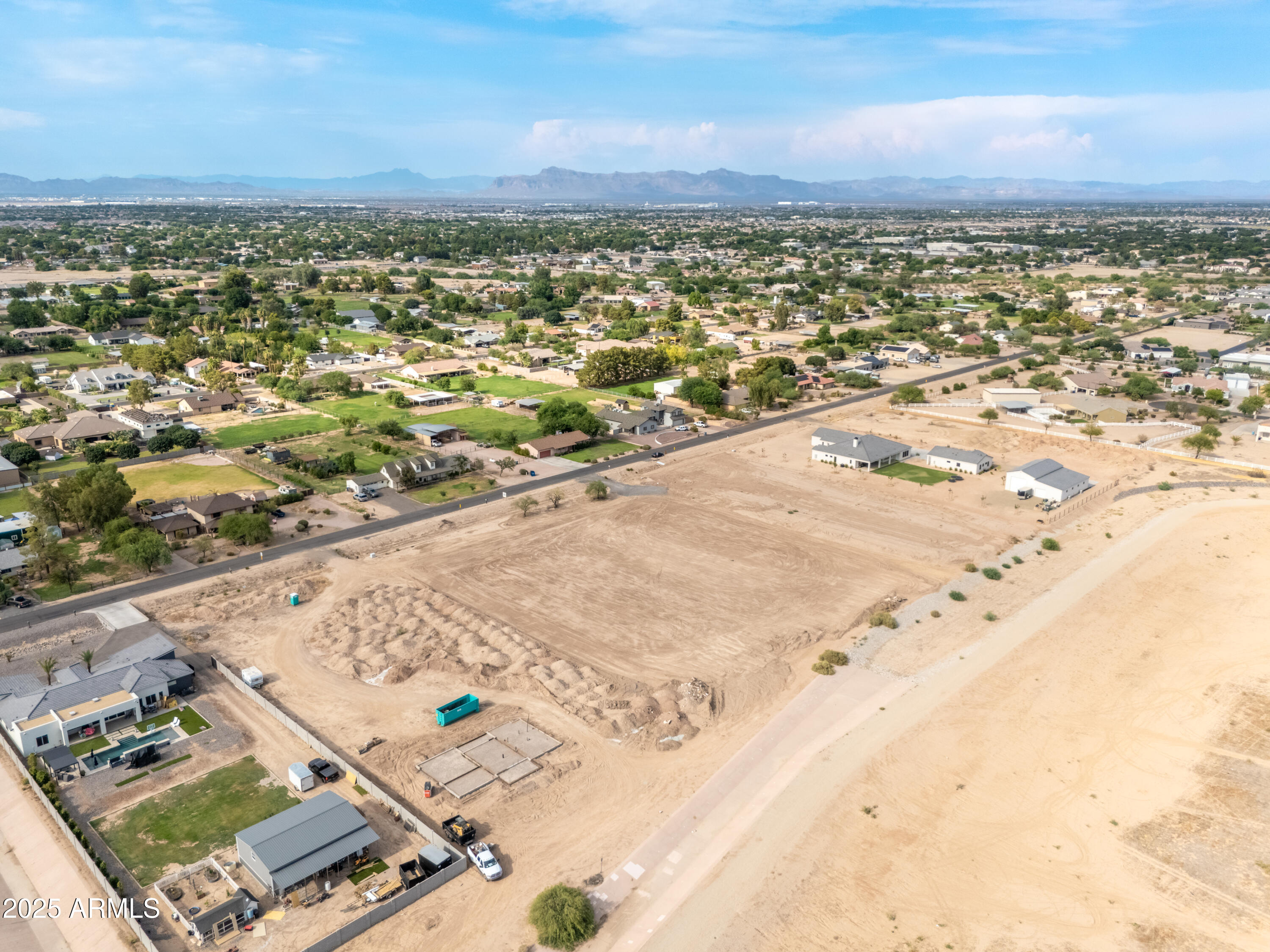 19215 East Cloud Road, Unit 2A Queen Creek, AZ 85142 - Photo 67 of 69 an aerial view of residential houses with outdoor space