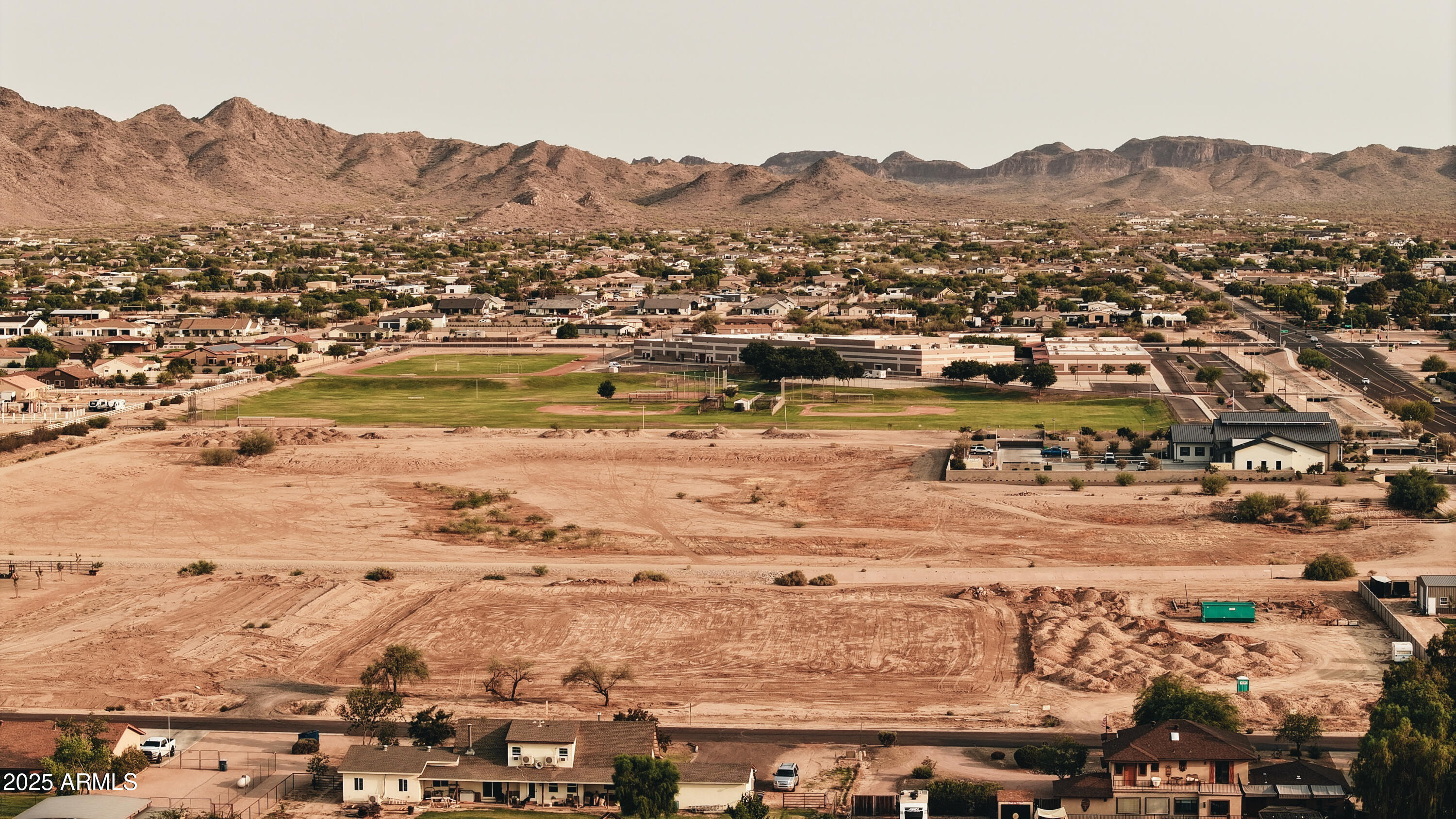 19215 East Cloud Road, Unit 2A Queen Creek, AZ 85142 - Photo 8 of 69 an aerial view of residential houses and outdoor space