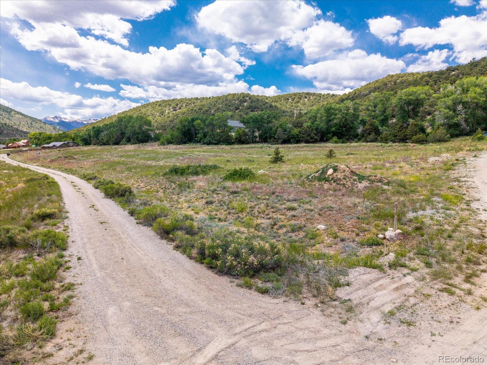 1 Rocky Mountain Road Salida, CO 81201 - Photo 7 of 25 a view of a pathway with a garden