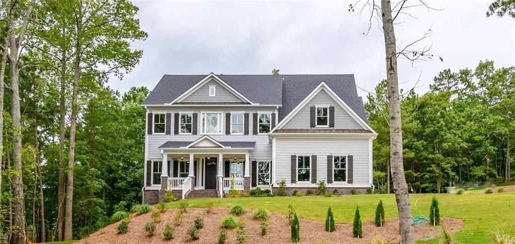 WELCOME HOME TO THIS STUNNING WESTPORT PLAN ON ALMOST AN ACRE HOMESITE! *PHOTO OF ACTUAL HOME*