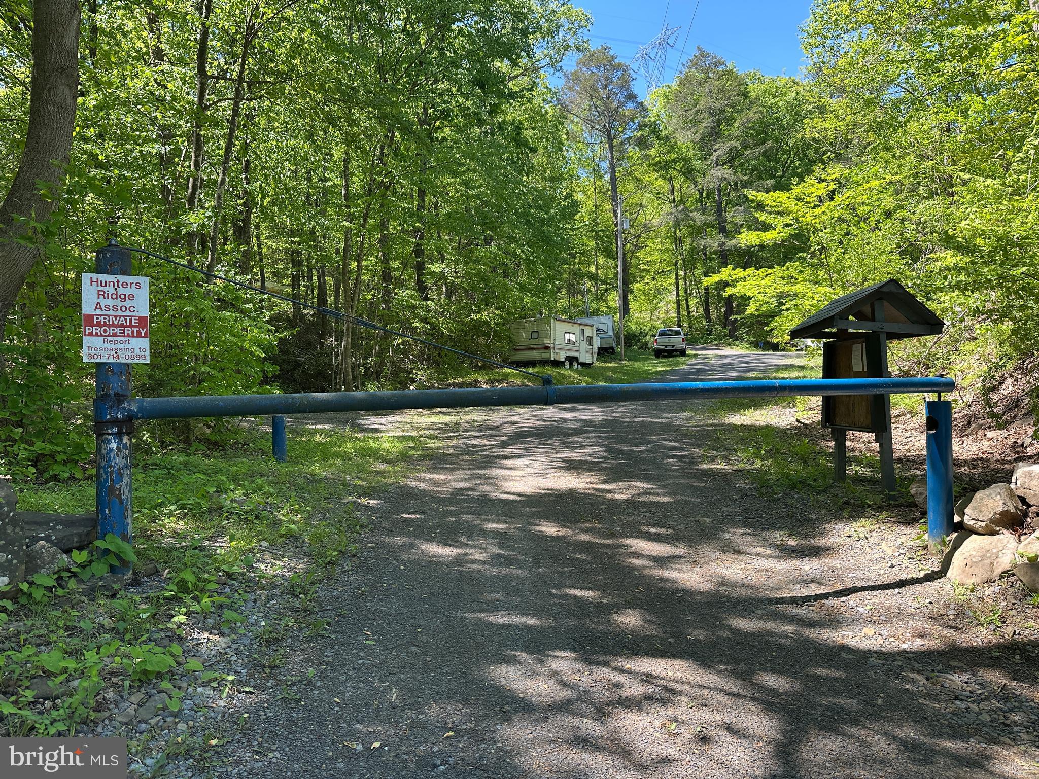181 Deer Run Road Baker, WV 26801 - Photo 18 of 71 a view of a street with a bench