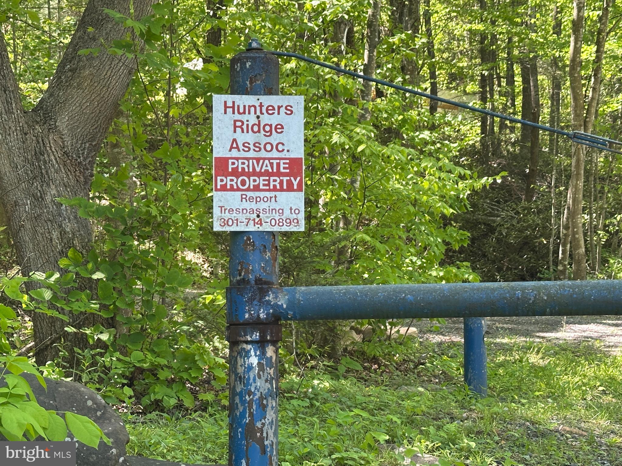 181 Deer Run Road Baker, WV 26801 - Photo 19 of 71 a sign on the side of a building