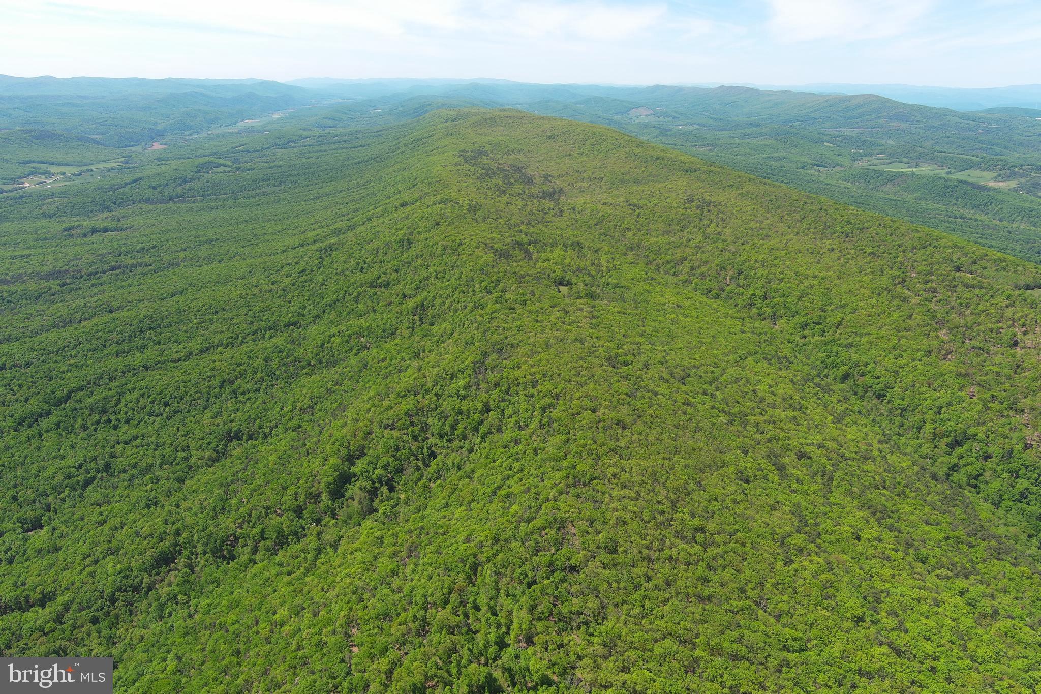 181 Deer Run Road Baker, WV 26801 - Photo 65 of 71 a view of a field with an ocean