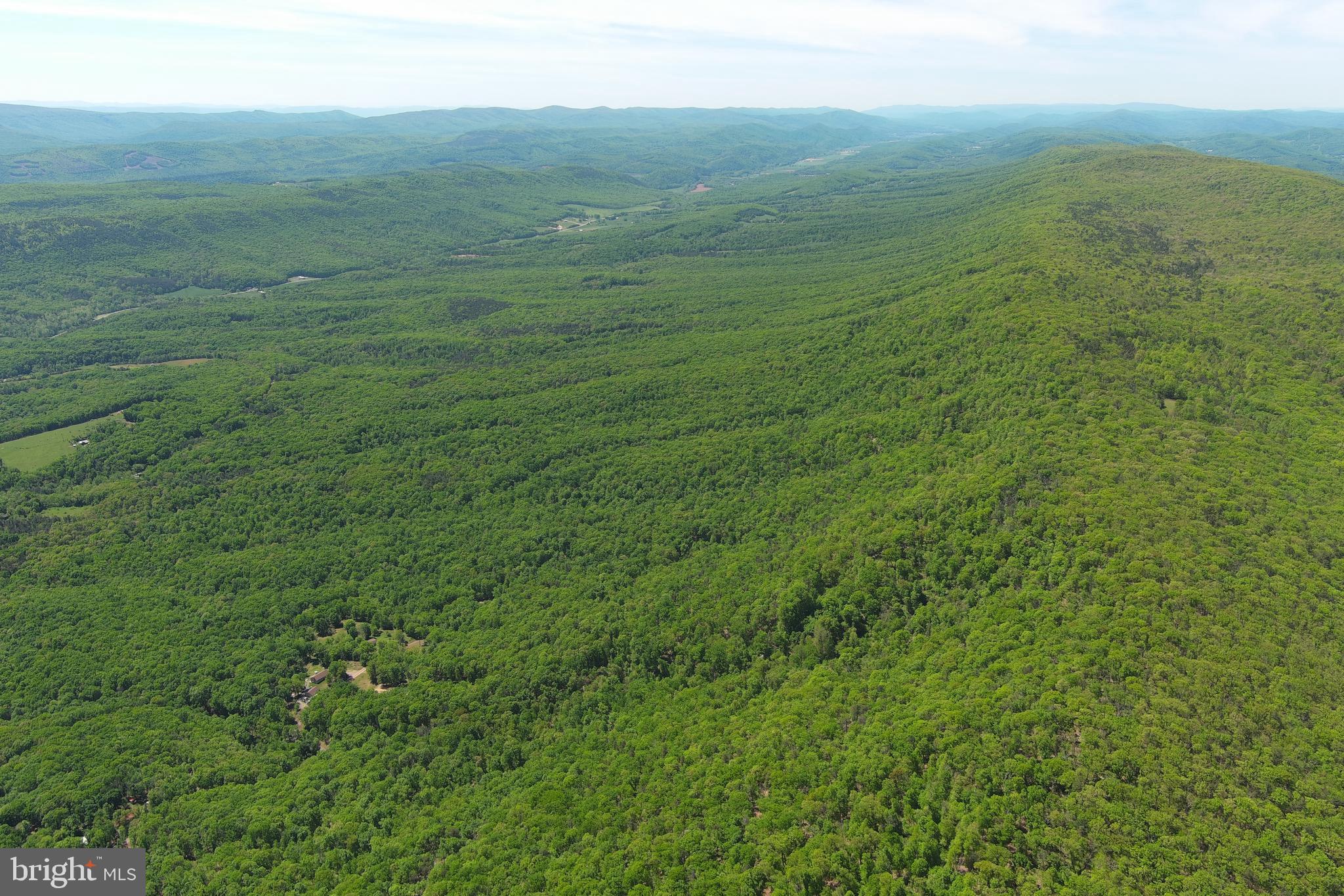 181 Deer Run Road Baker, WV 26801 - Photo 67 of 71 a view of a field with an ocean