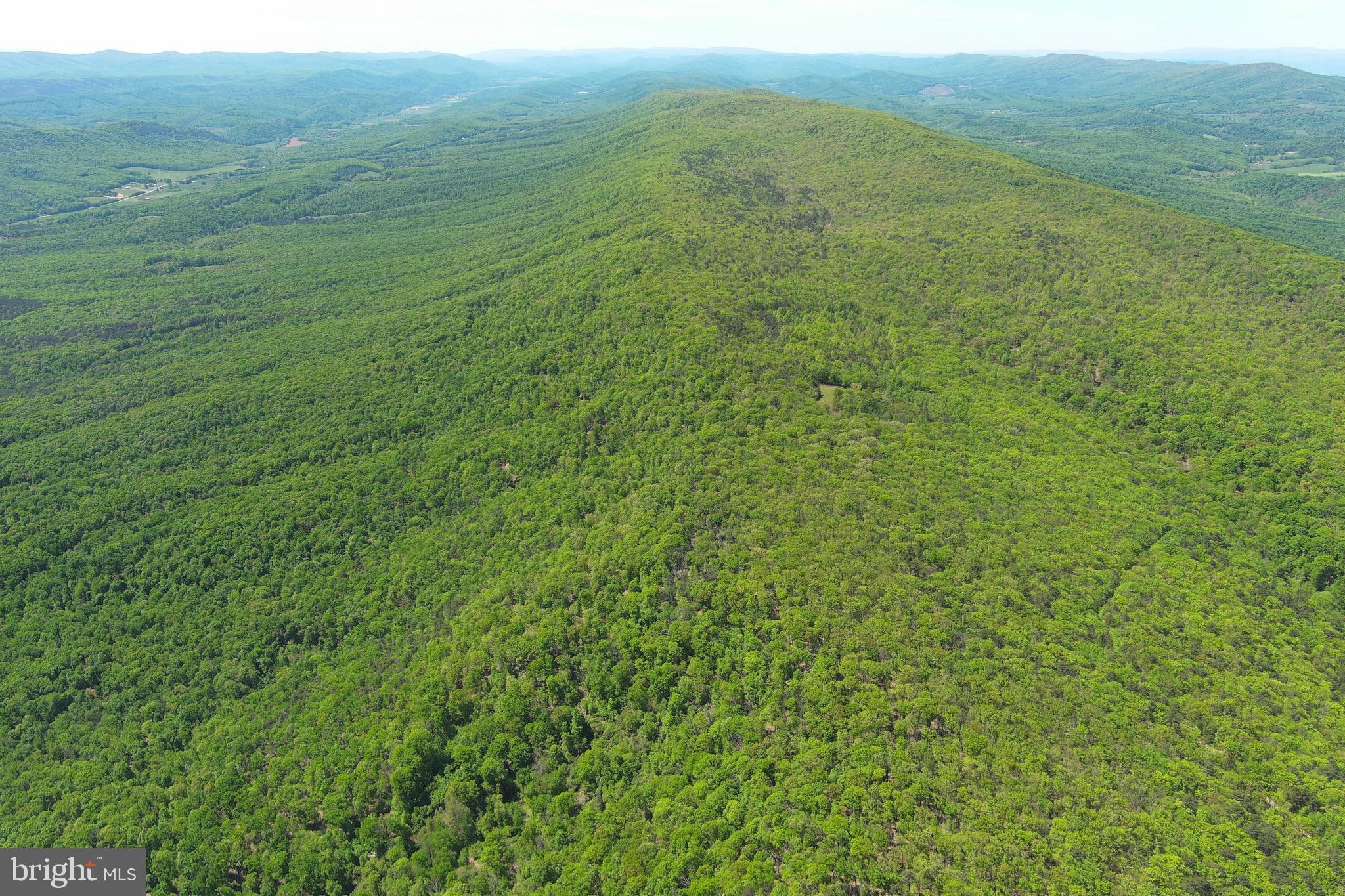 181 Deer Run Road Baker, WV 26801 - Photo 69 of 71 a view of a field with an ocean view