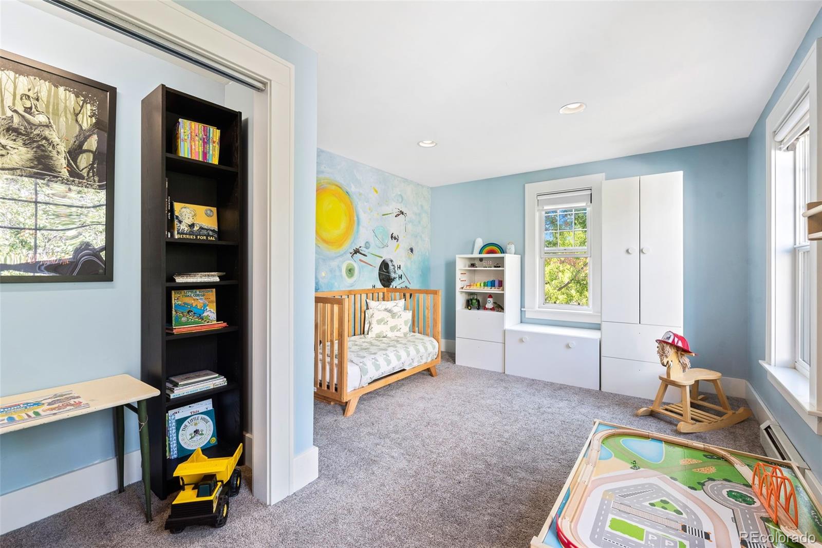 1205 Niagara Street Denver, CO 80220 - Photo 21 of 38 a bedroom with bed and a window
